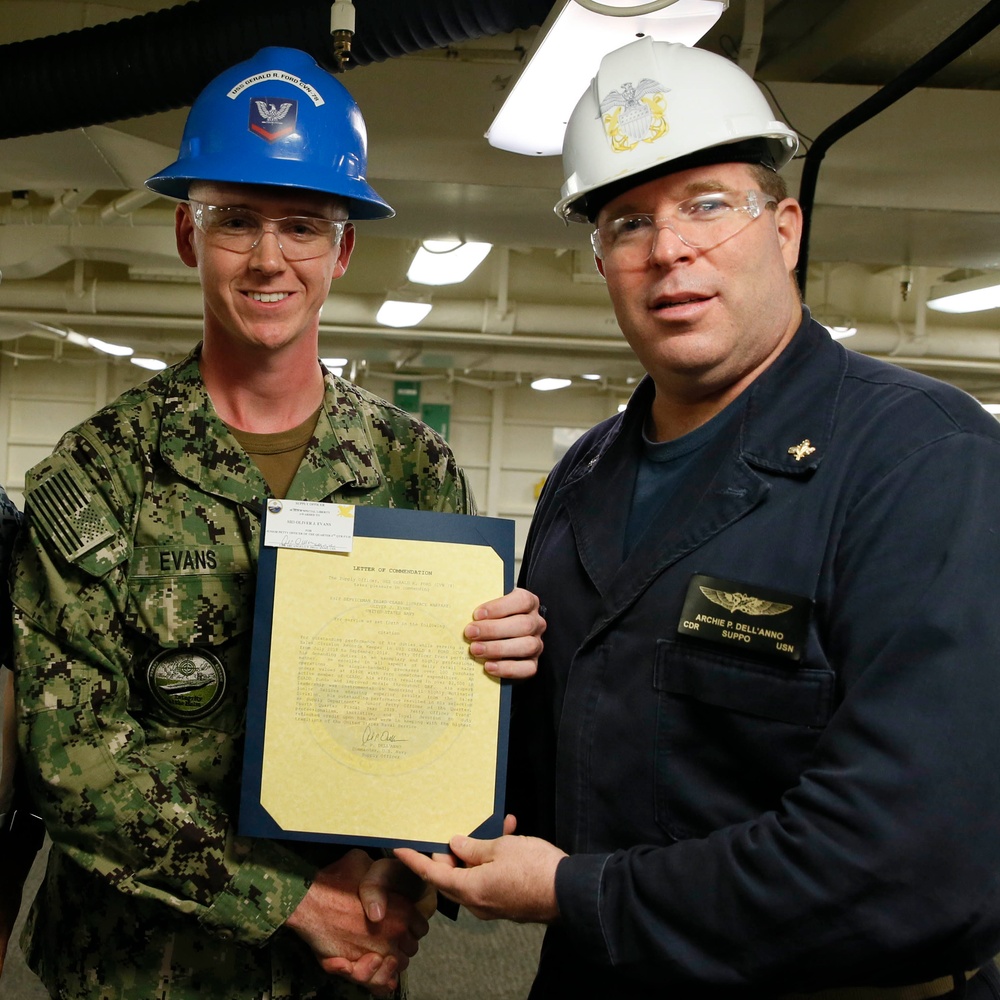 USS Gerald R. Ford (CVN 78) supply department's awards at quarters.