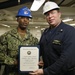 USS Gerald R. Ford (CVN 78) supply department's awards at quarters.