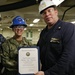 USS Gerald R. Ford (CVN 78) supply department's awards at quarters.