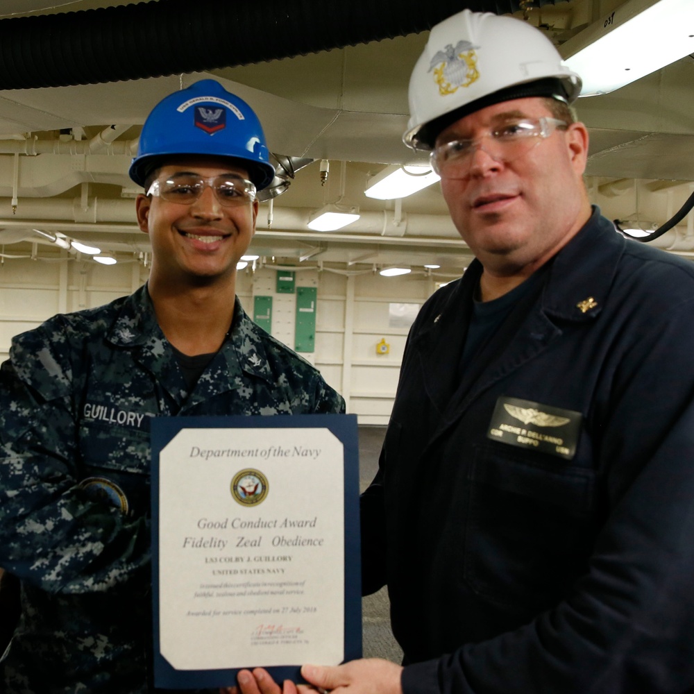 USS Gerald R. Ford (CVN 78) supply department's awards at quarters.