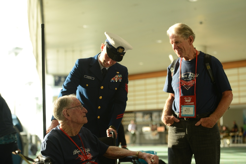 Coast Guard members visit with war veterans at PDX