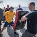 Sailors battle the O.C. Spray course for security reaction force basic training on USS Jason Dunham (DDG 109)