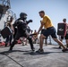 Sailors battle the O.C. Spray course for security reaction force basic training on USS Jason Dunham (DDG 109)
