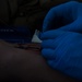 Corpsmen with Battalion Landing Team, 2nd Battalion, 5th Marines, simulate fresh whole blood auto-transfusion