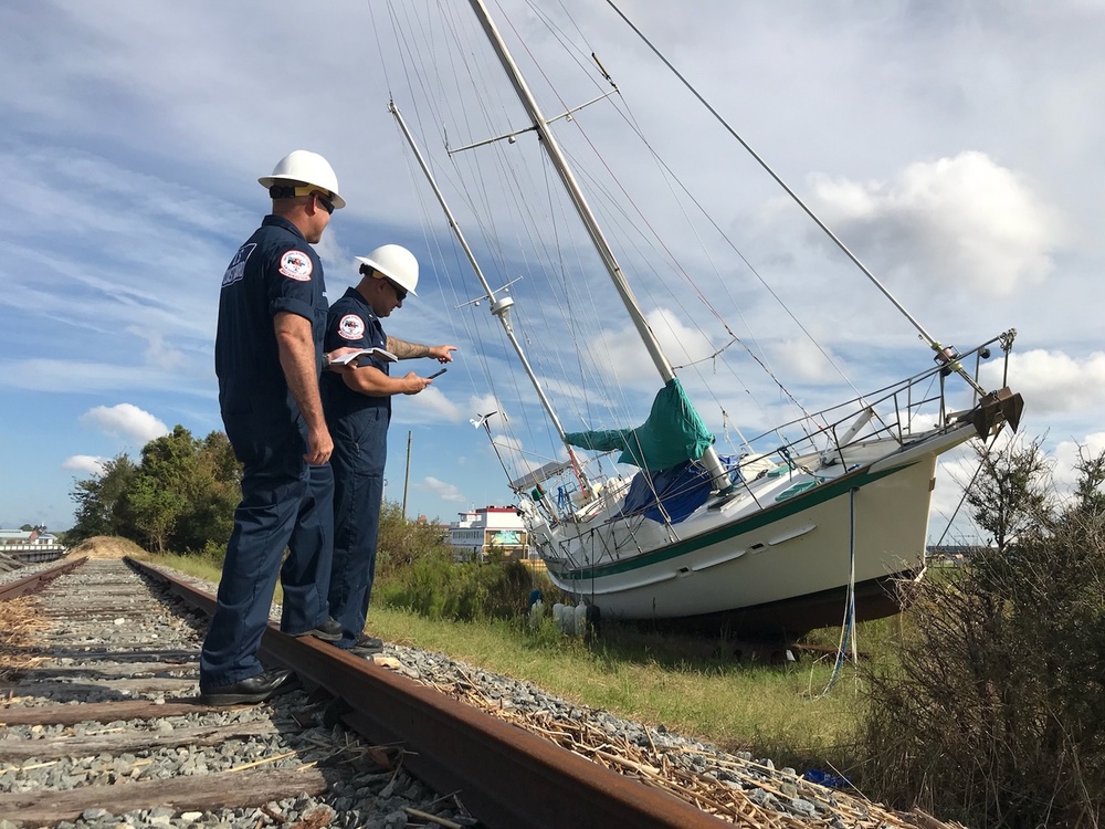 Coast Guard evaluates sailboat displaced by Hurricane Florence