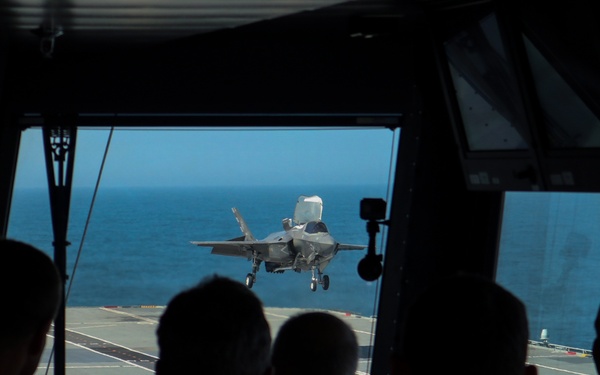 Fighter jets join forces with British aircraft carrier to make history