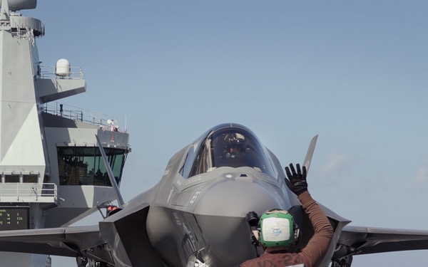 Fighter jets join forces with British aircraft carrier to make history