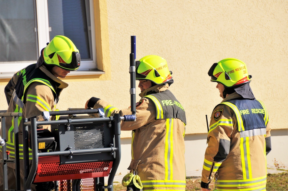 Firefighters demonstrate evacuation and rescue procedures