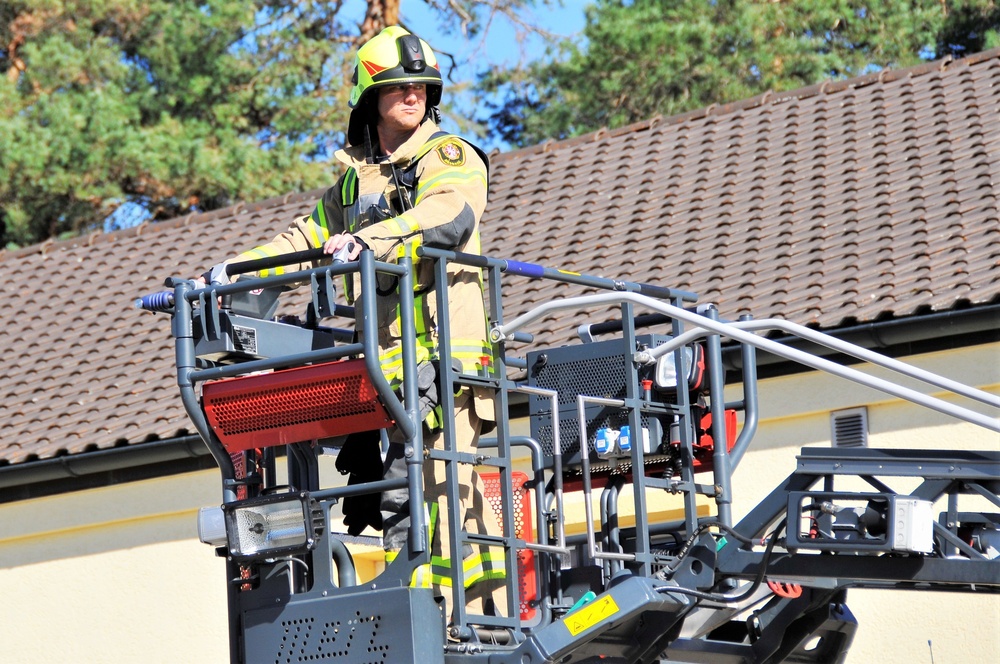 Firefighters demonstrate evacuation and rescue procedures