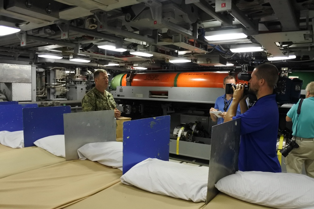 Capt. Jesse Zimbauer, commanding officer of precommissioning unit Indiana (SSN 789) speaks with media in the torpedo room.