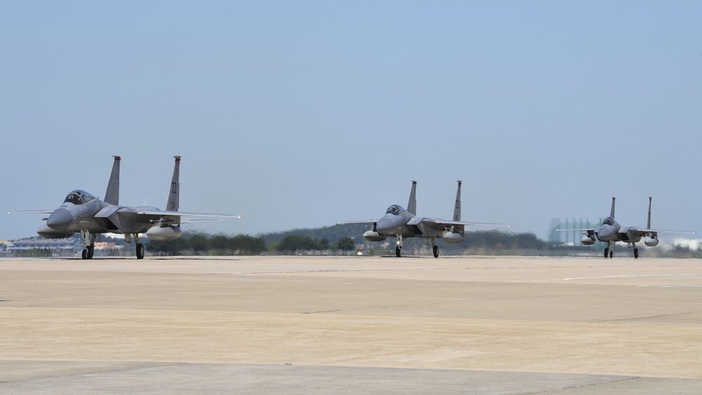 Kadena AB F-15s, C-130s bed down with Wolf Pack during Typhoon Trami