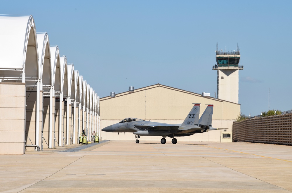 Kadena AB F-15s, C-130s bed down with Wolf Pack during Typhoon Trami