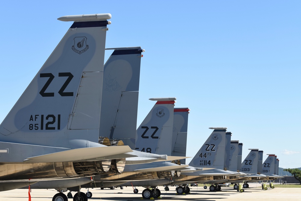 Kadena AB F-15s, C-130s bed down with Wolf Pack during Typhoon Trami