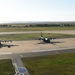 Kadena AB F-15s, C-130s bed down with Wolf Pack during Typhoon Trami