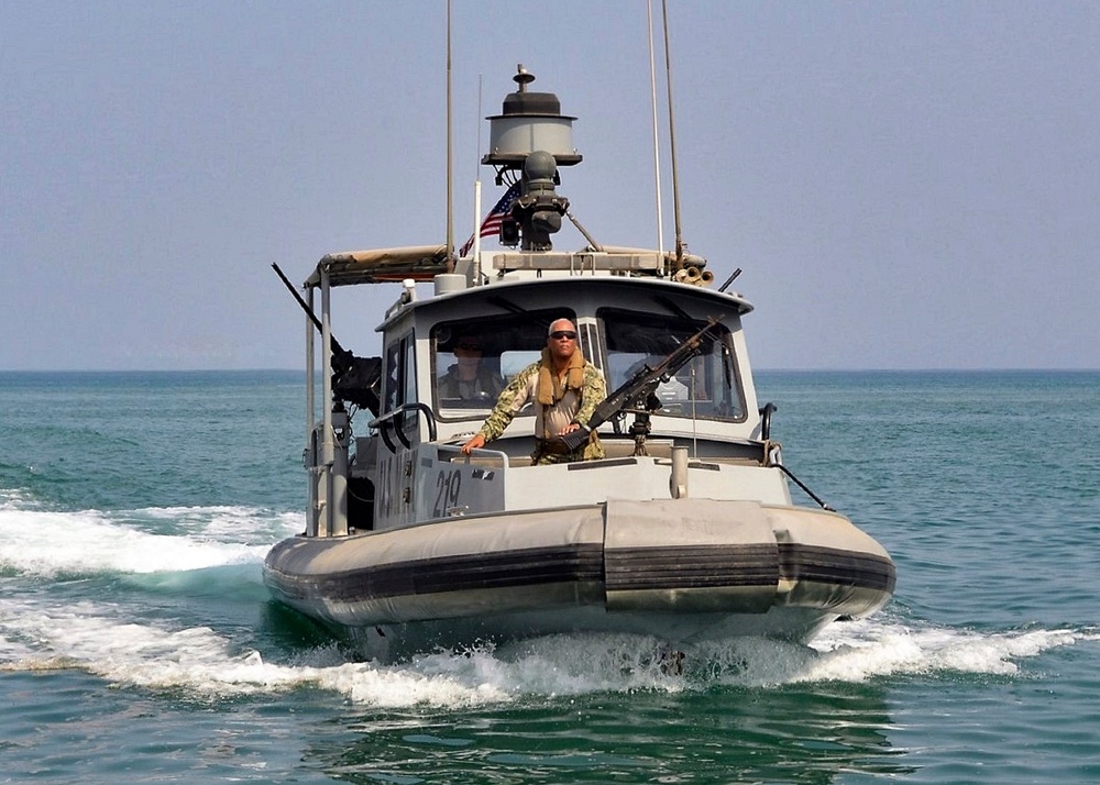 Crewman onboard SeaArk patrol boat