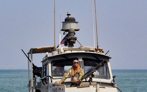 Crewman onboard SeaArk patrol boat