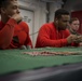 Sailors Play Poker Aboard GHWB
