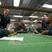 Sailors Play Poker Aboard GHWB