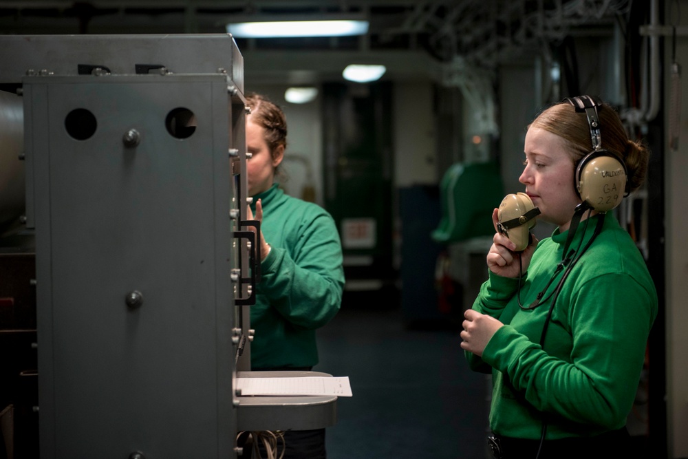 Sailors Operate Arresting Gear Equipment