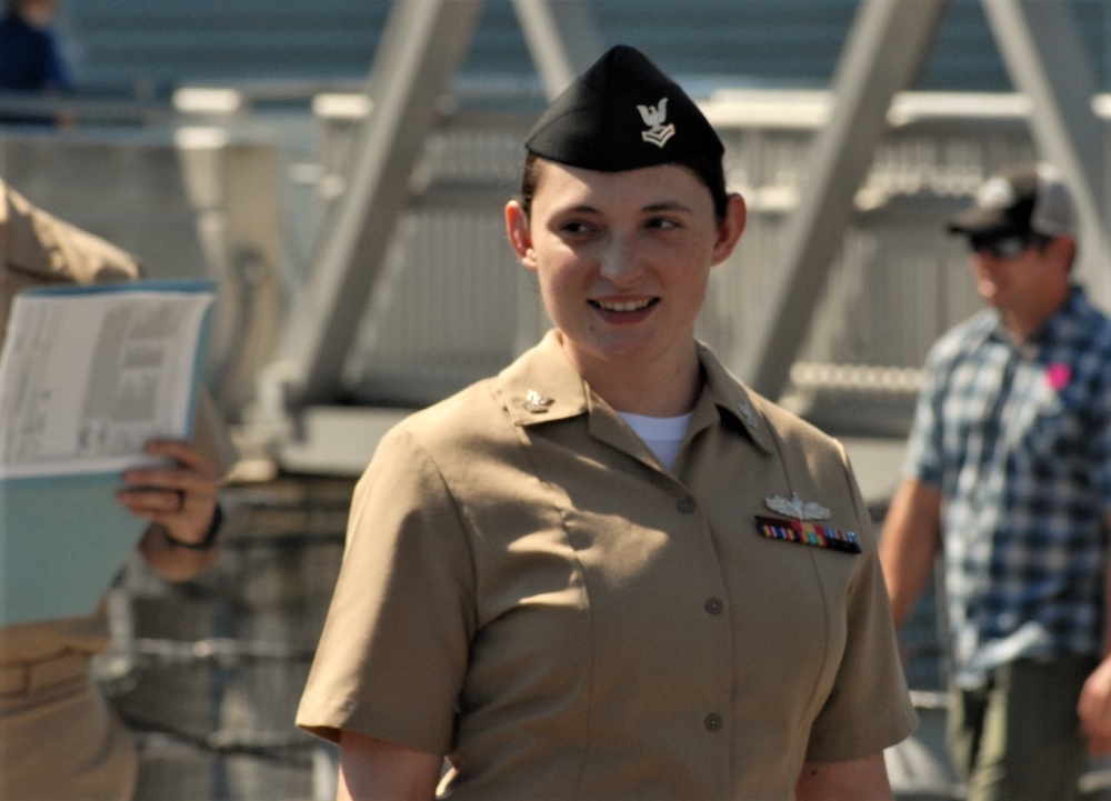 STG2(SW) Wells re-enlistment aboard the USS Wisconsin (BB-64)