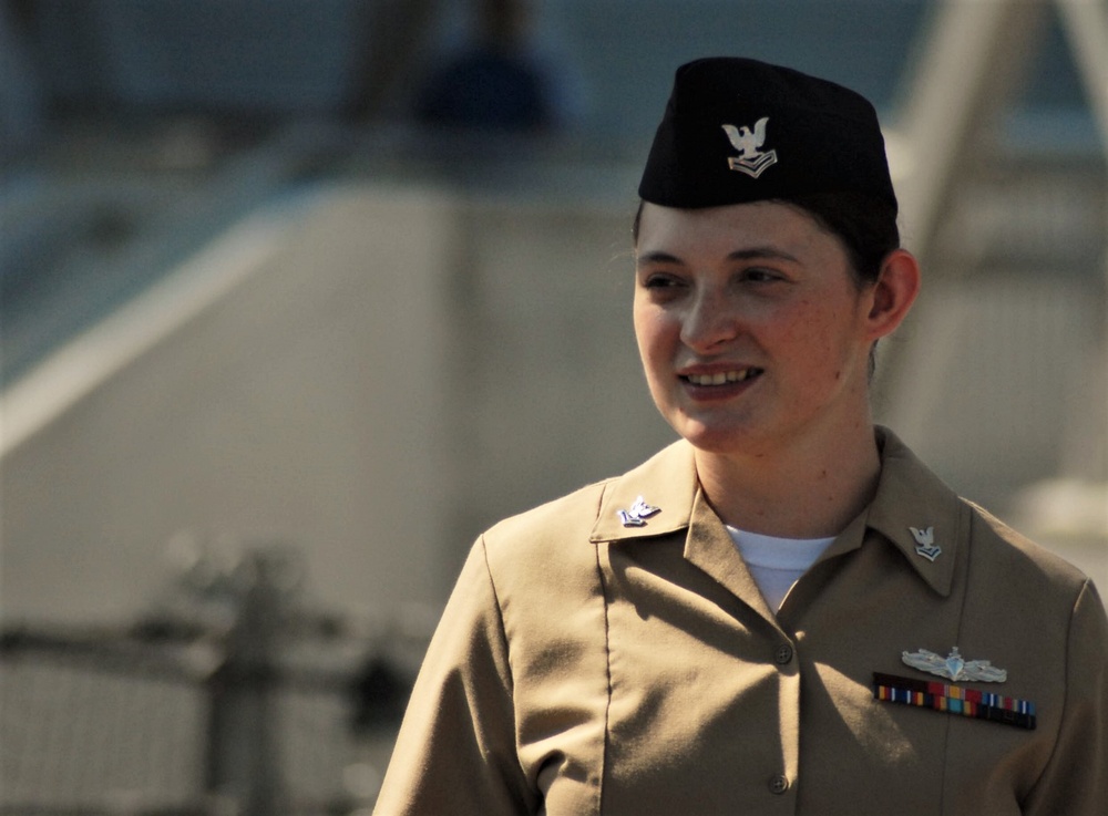 STG2(SW) Wells re-enlistment aboard the USS Wisconsin (BB-64)