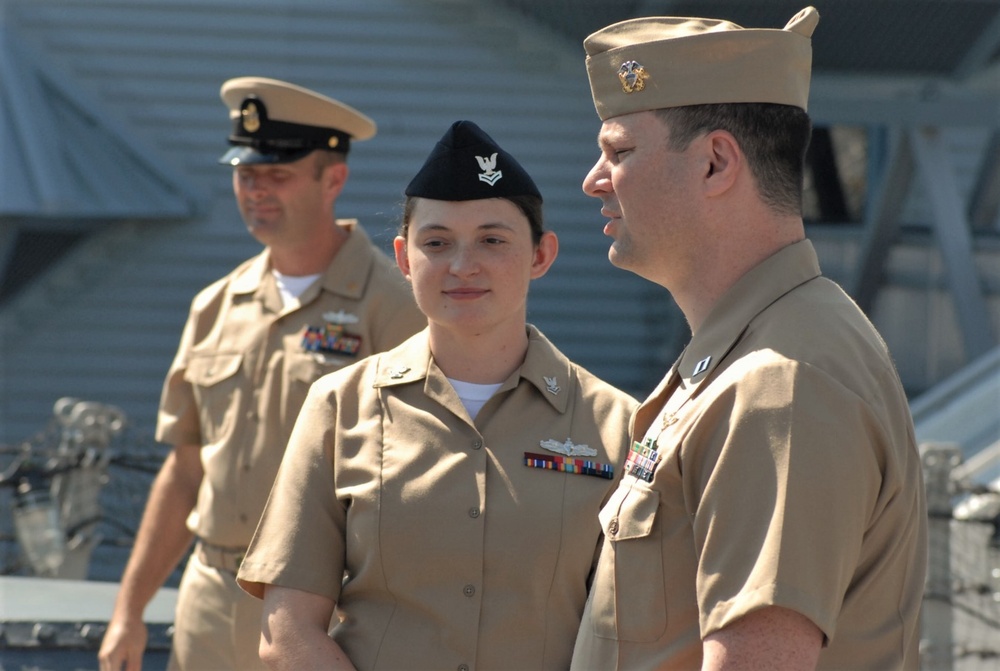 STG2(SW) Wells re-enlistment aboard the USS Wisconsin (BB-64)