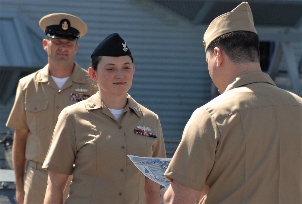 STG2(SW) Wells re-enlistment aboard the USS Wisconsin (BB-64)