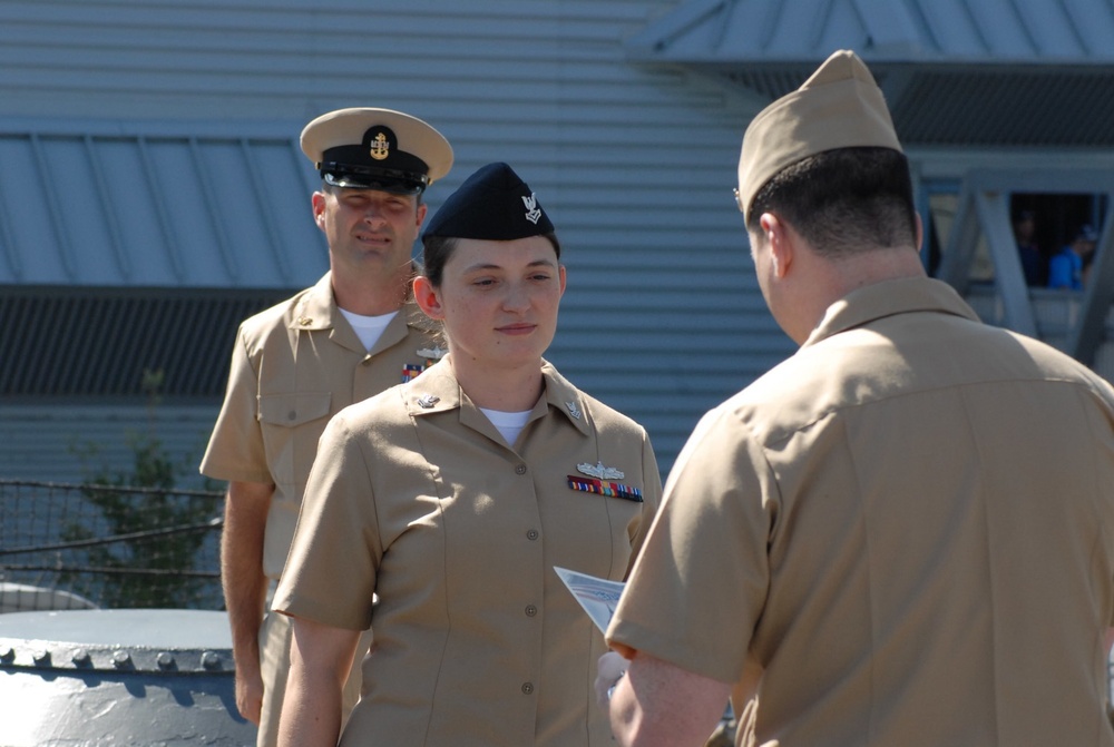 STG2(SW) Wells re-enlistment aboard the USS Wisconsin (BB-64)