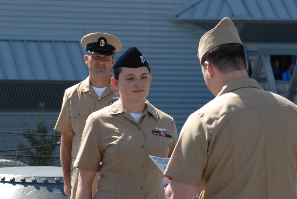 STG2(SW) Wells re-enlistment aboard the USS Wisconsin (BB-64)