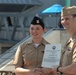 STG2(SW) Wells re-enlistment aboard the USS Wisconsin (BB-64)