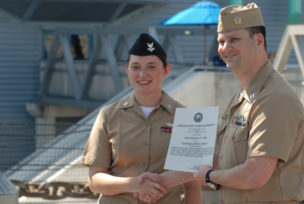 STG2(SW) Wells re-enlistment aboard the USS Wisconsin (BB-64)