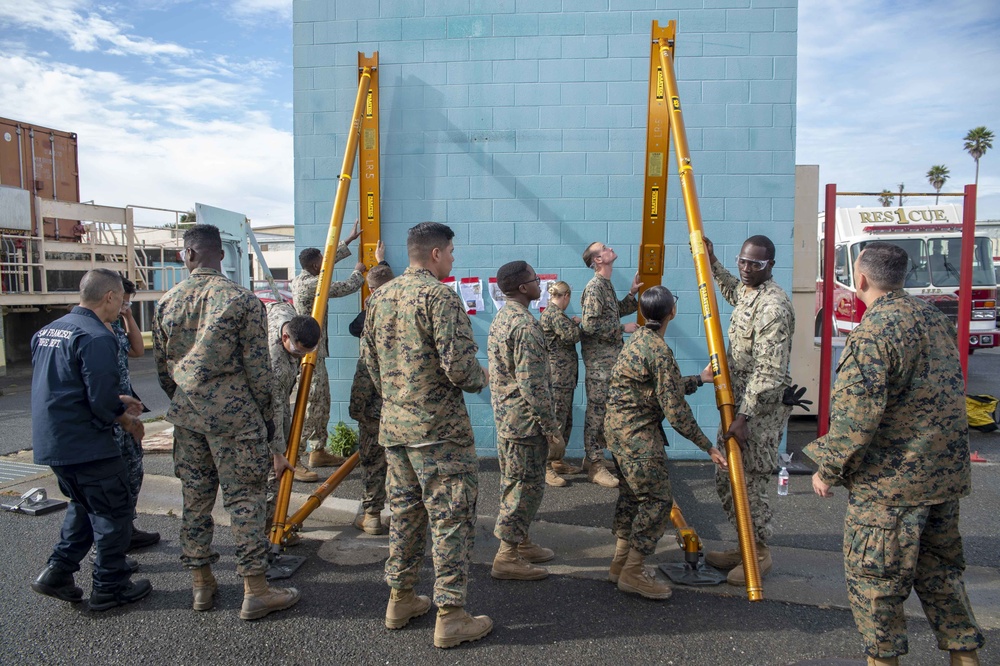 San Francisco Fire department train Sailors and Marines in rescue techniques