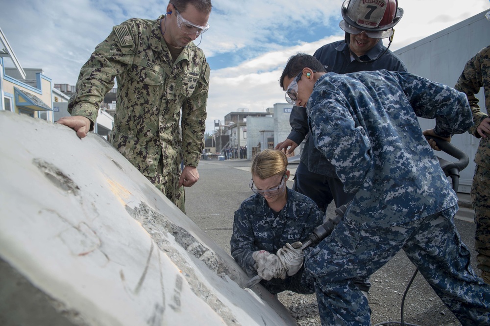 San Francisco Fire department train Sailors and Marines in rescue techniques