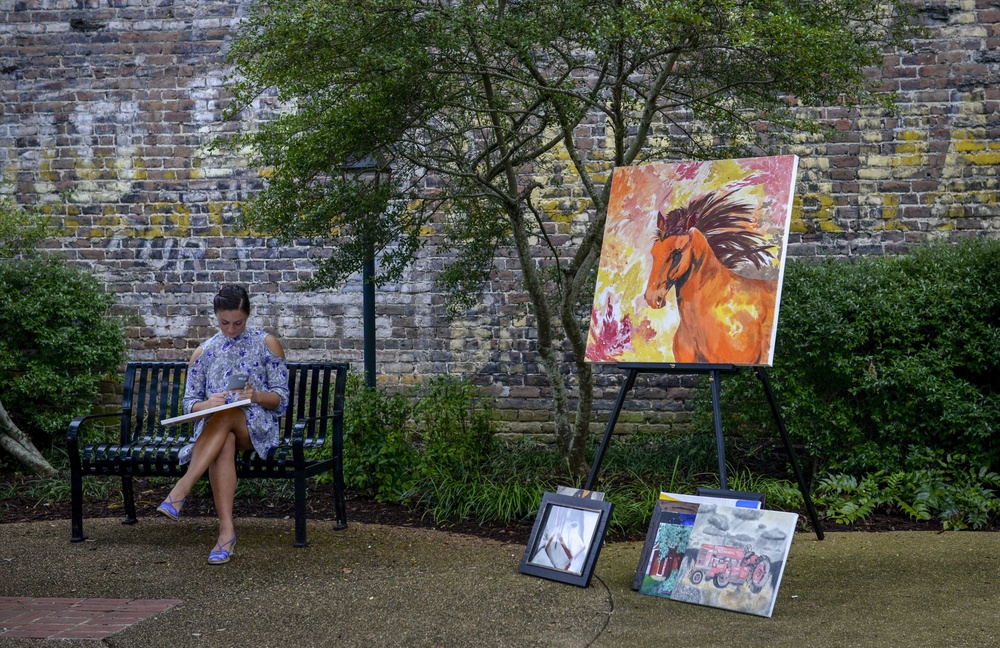 Student pilot showcases paintings in Columbus’s Art Walk