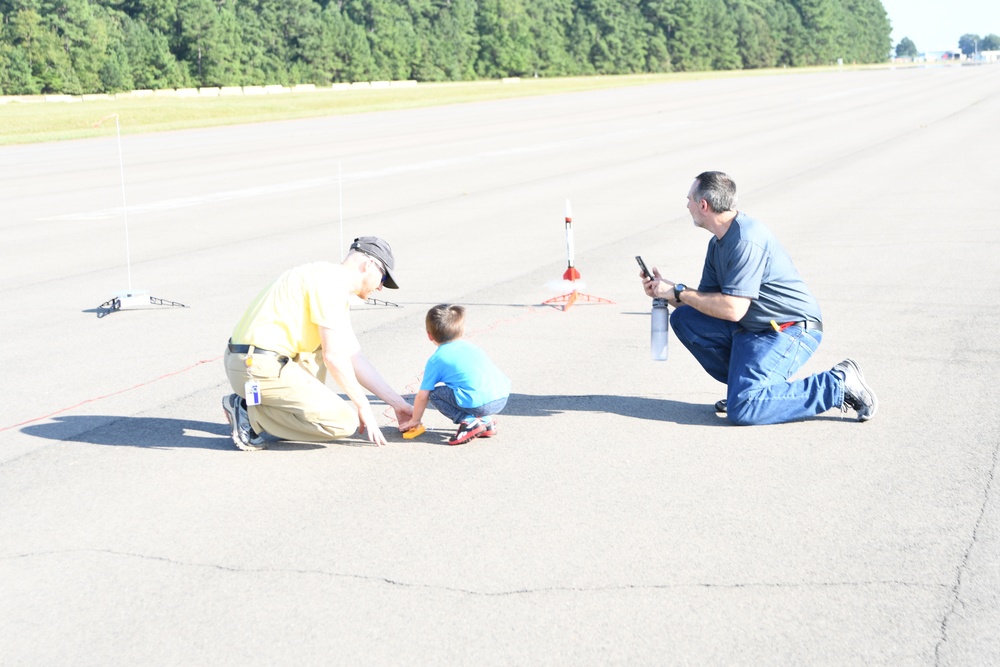 Parents and Children Launch Home-made Rockets at NSWC Dahlgren Centennial Contest