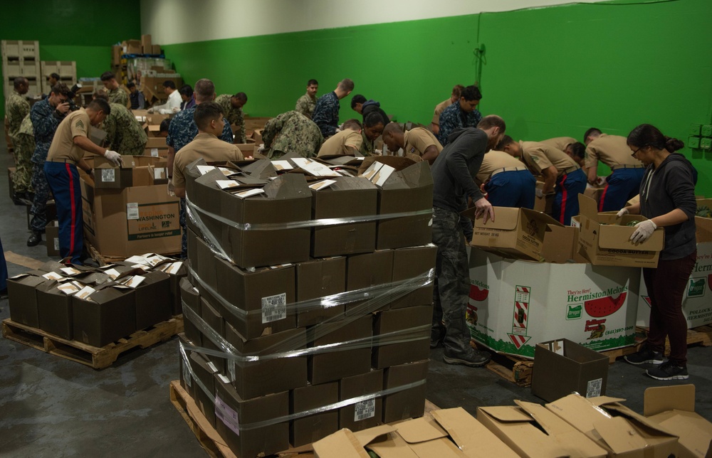 Marines and Sailors volunteer at the San Francisco Food Bank