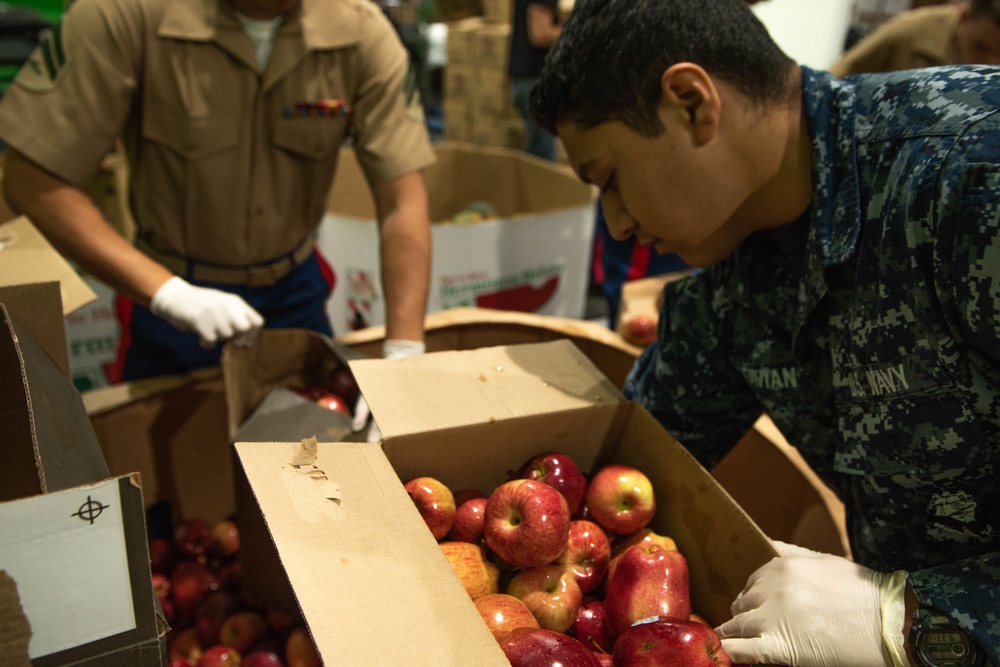 Marines and Sailors volunteer at the San Francisco Food Bank