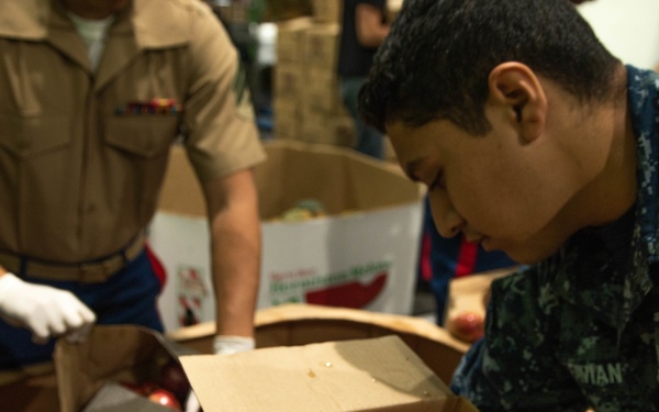 Marines and Sailors volunteer at the San Francisco Food Bank