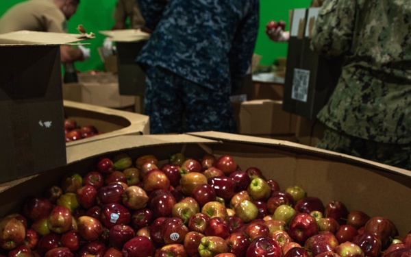 Marines and Sailors volunteer at the San Francisco Food Bank