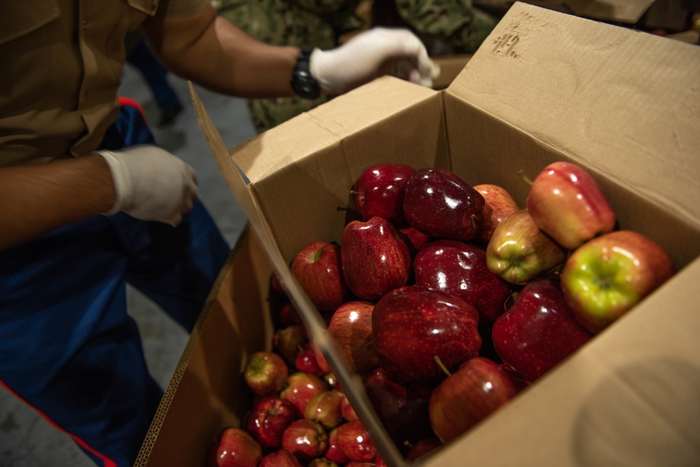 Marines and Sailors volunteer at the San Francisco Food Bank