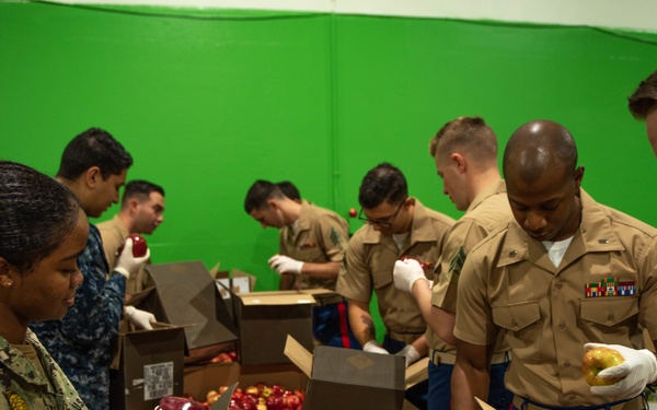 Marines and Sailors volunteer at the San Francisco Food Bank