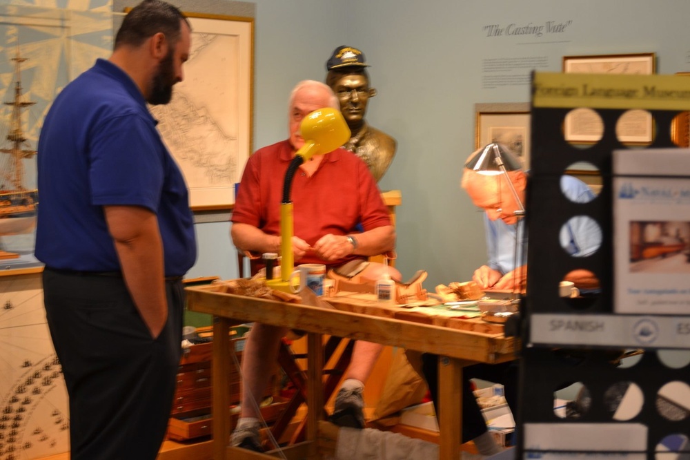 Model shipbuilders at Naval Museum
