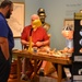 Model shipbuilders at Naval Museum