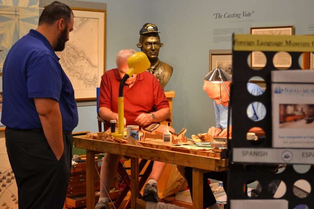 Model shipbuilders at Naval Museum
