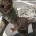 Marines in the Non-Lethal Course take part in the OC Spray Confidence Course