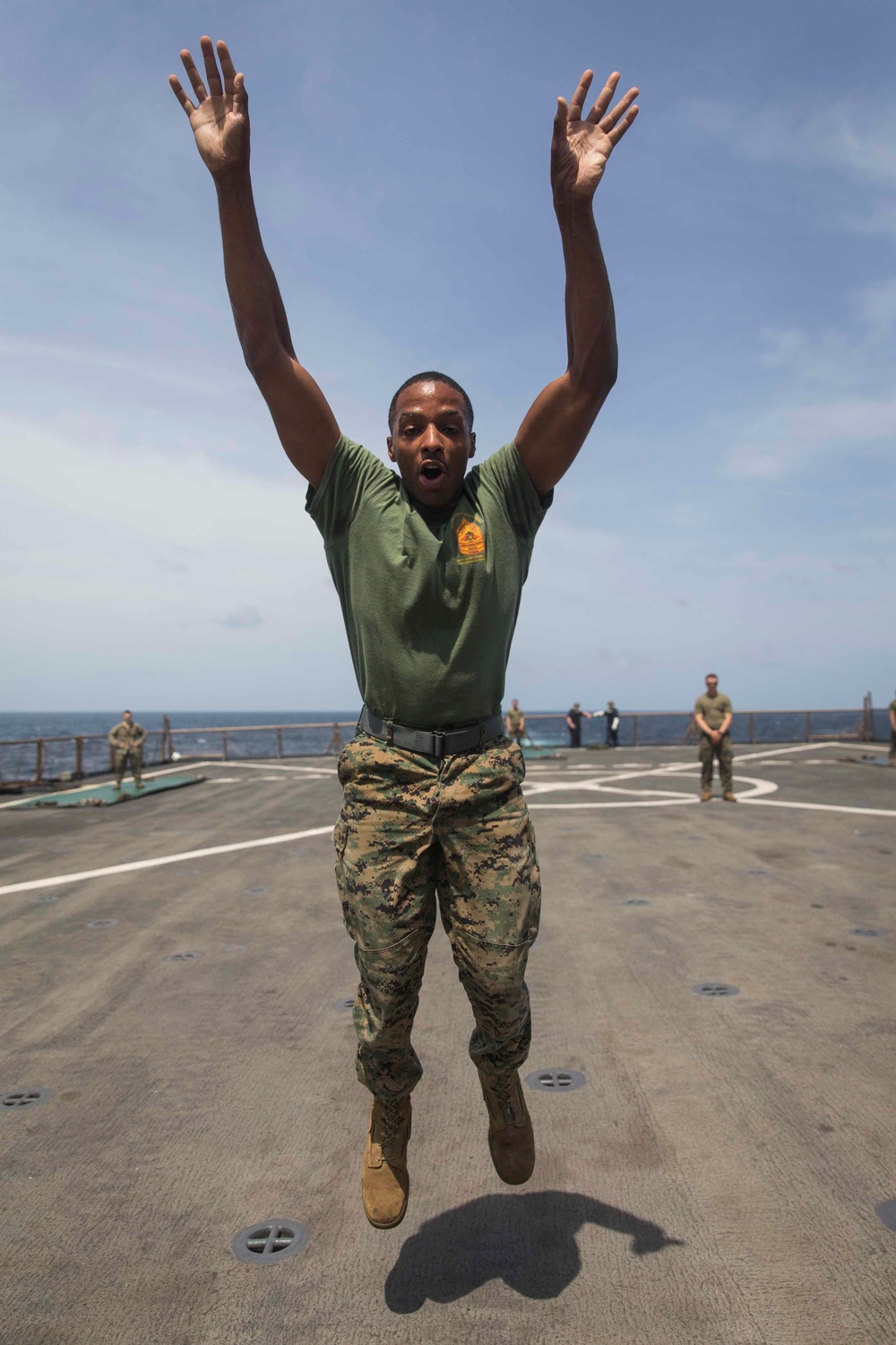 Marines in the Non-Lethal Course take part in the OC Spray Confidence Course