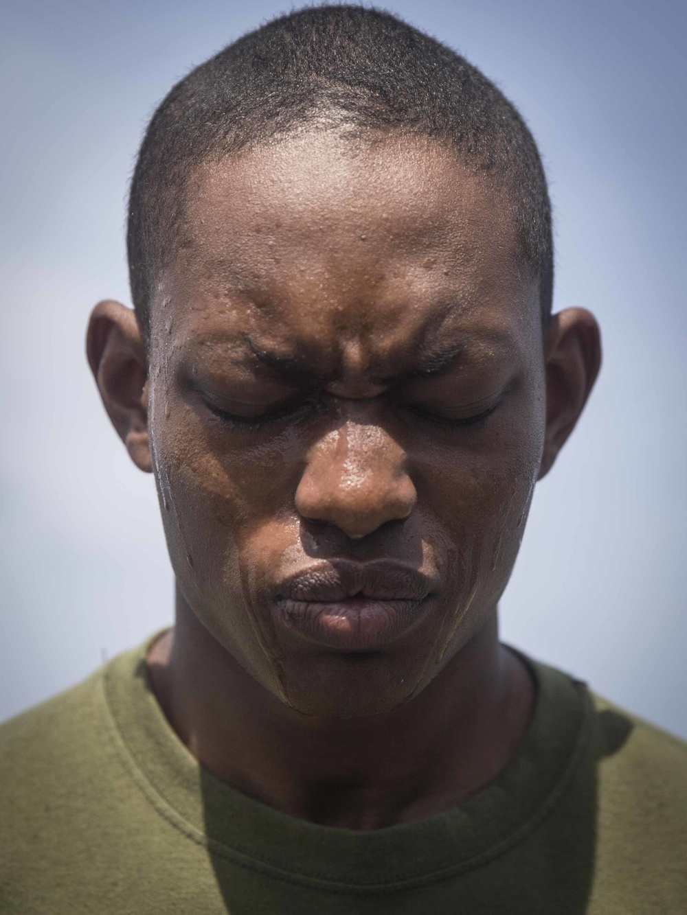 Marines in the Non-Lethal Course take part in the OC Spray Confidence Course