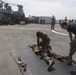 Marines in the Non-Lethal Course take part in the OC Spray Confidence Course