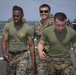 Marines in the Non-Lethal Course take part in the OC Spray Confidence Course