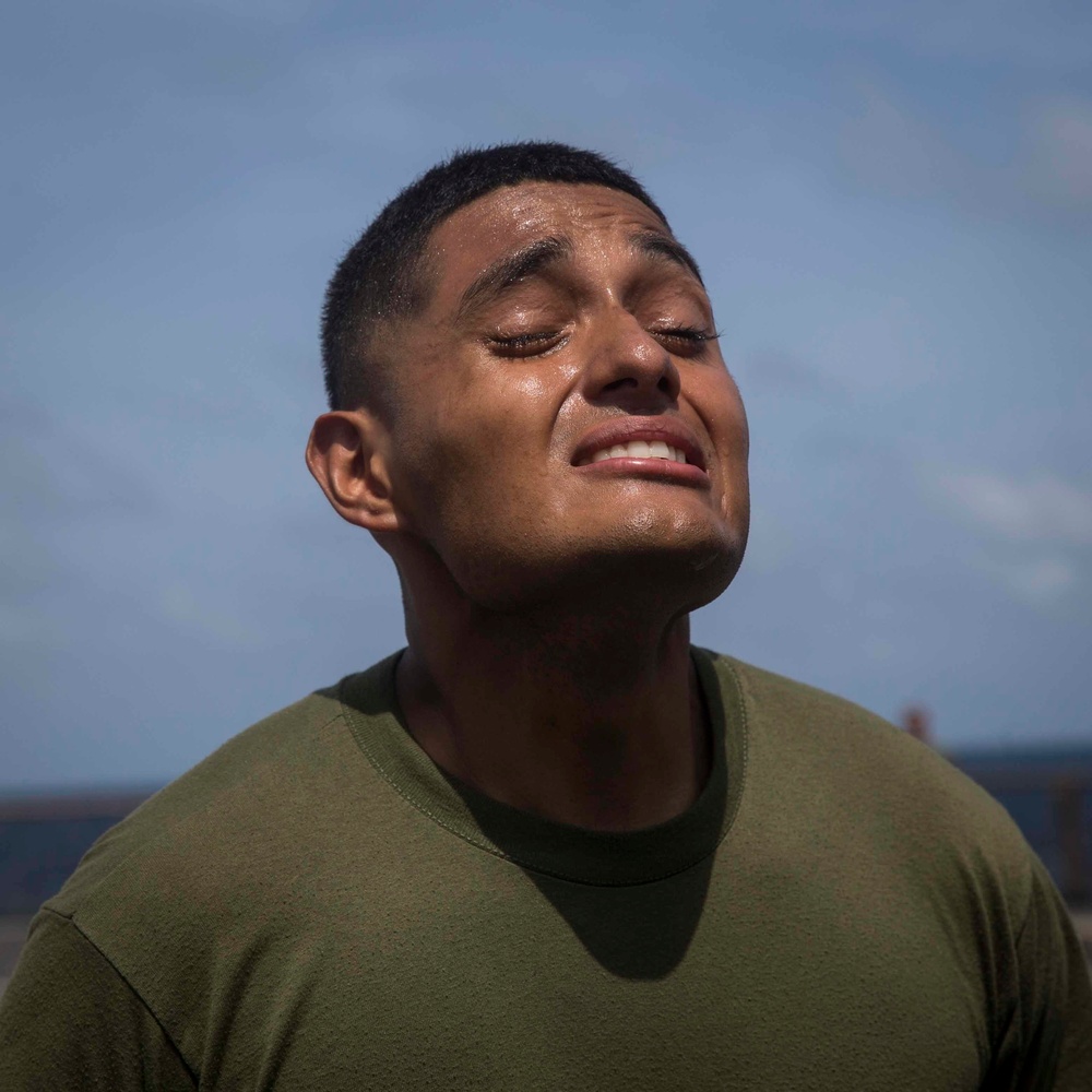 Marines in the Non-Lethal Course take part in the OC Spray Confidence Course